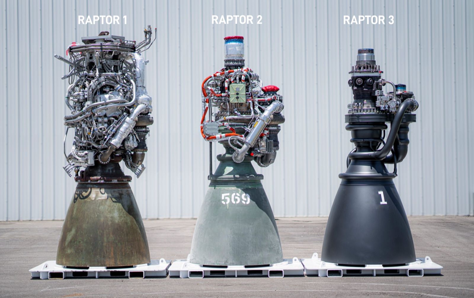 Three SpaceX Raptor engines side by side, labelled Raptor 1, Raptor 2 and Raptor 3. Each has visibly fewer external pipes, wires and brackets than the one before it.
